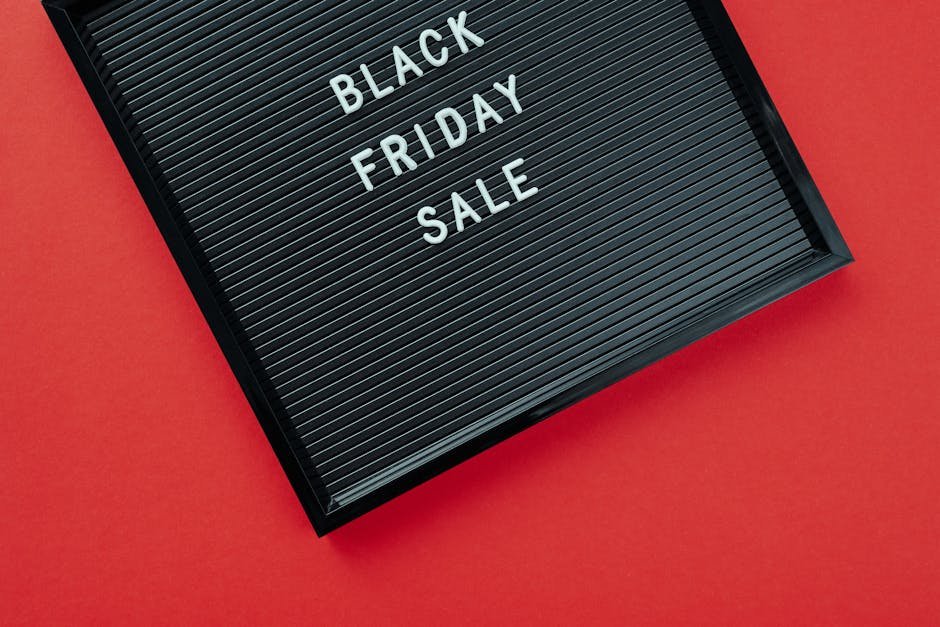Black Friday sale sign on bold red surface, perfect for promotions.