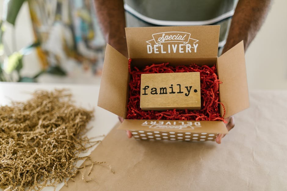 A delivery box containing a family-themed keepsake, perfect for gifts.