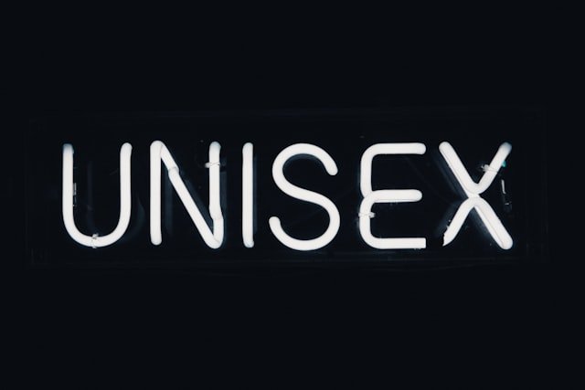 a neon sign that reads unisex