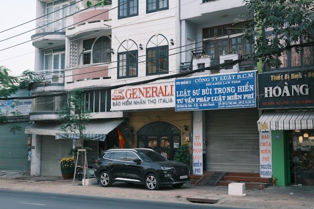 A car is parked in front of a building