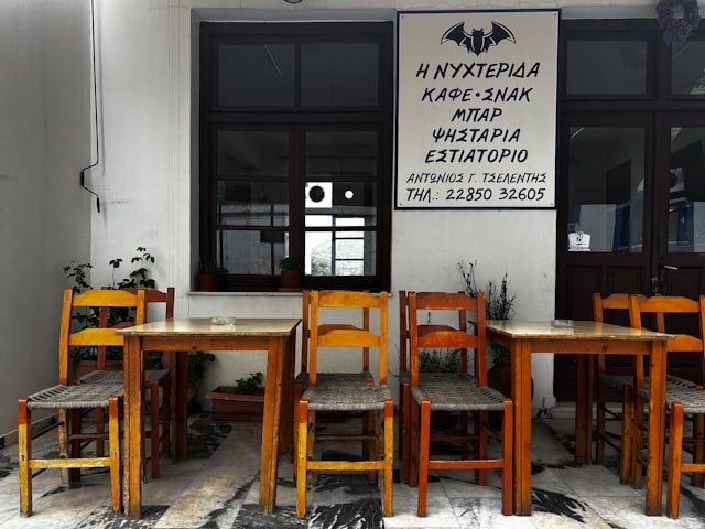 Wooden tables and chairs in a cafe