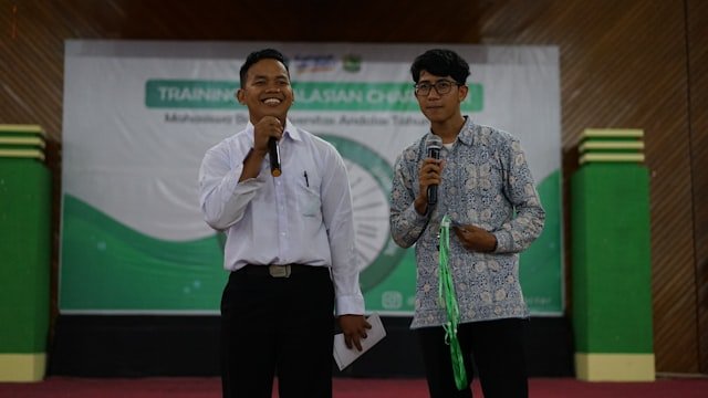 a couple of men holding microphones